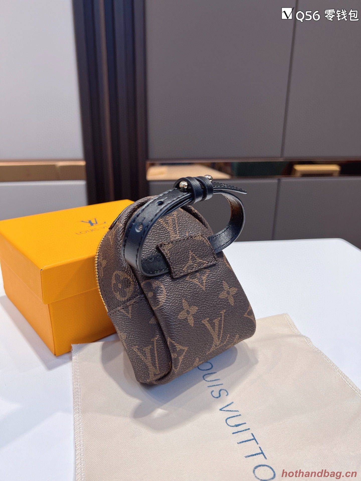 Louis Vuitton Monogram Canvas Mini Wrist Bag M12587 Louis Vuitton Monogram Canvas Mini Wrist Bag M12587