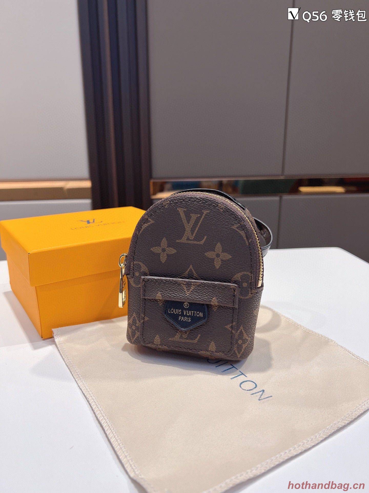 Louis Vuitton Monogram Canvas Mini Wrist Bag M12587 Louis Vuitton Monogram Canvas Mini Wrist Bag M12587